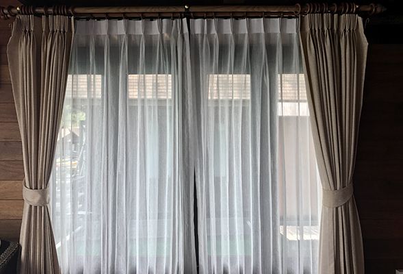 Use Curtains and Blinds to Keep the Heat Out